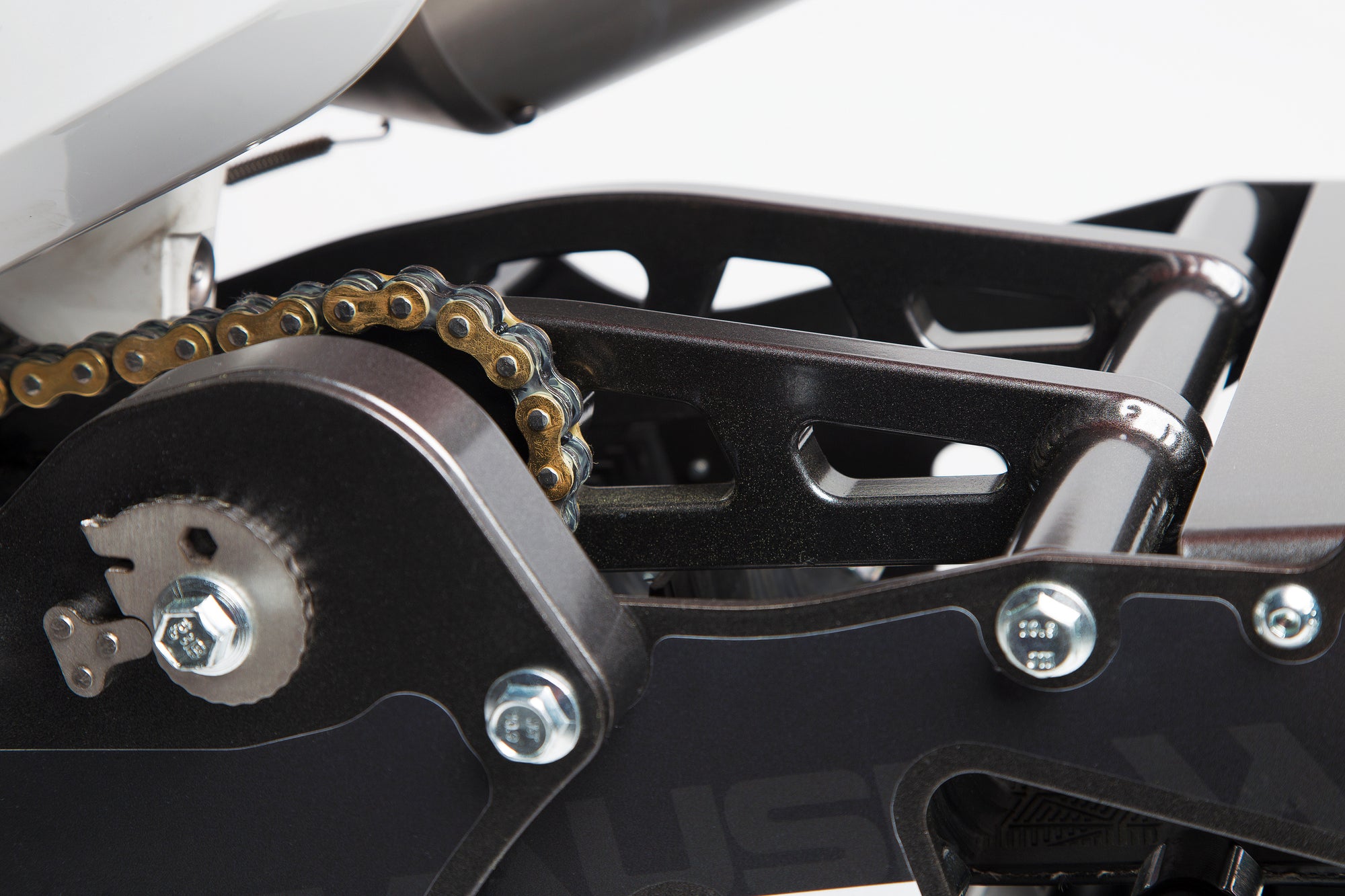 Chain tension adjuster